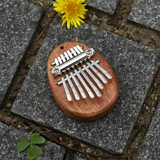 1pc mini kalimba 8 chave polegar piano bonito instrumento portátil para iniciantes conjunto de presente requintado para crianças mini instrumentos kalimba